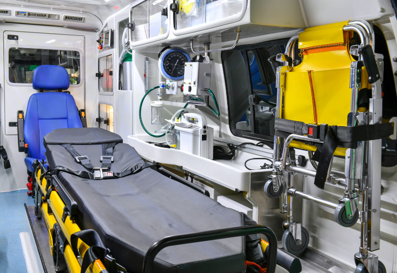 The back of the ambulance pictured is a stretcher, stair chair, and other accessories needed for patients.